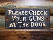 VINTAGE CHECK YOUR GUN AT THE DOOR SIGN OLD CAST IRON FIREARM RIFLE RULES PLAQUE picture