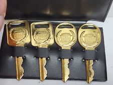 Rare Vintage Set 4 Uncut Cadillac Gold Car Keys Blanks in Key Holder 1968 - 1990 picture