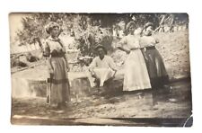 RPPC Women Standing in Stream Seated Man Fallen Tree c1910s photo postcard IP16 picture