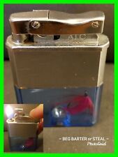 Vintage ATC Cigarette Lighter Blue Bottom Neon Pink Fly Fish Lure Inside Working picture