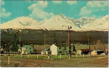 HAINES JUNCTION, Yukon Canada  View of TOWN, ST ELIAS MTNS   c1950s  Postcard picture