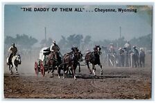 c1940's The Daddy Of Them All Cheyenne Wyoming WY, Chuckwagon Racing Postcard picture