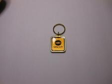 RARE VINTAGE NEW GOLD MINOLTA CAMERA BRASS KEY CHAIN KEYRING FOB IN BAG picture