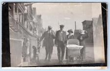 1915 RPPC NEWARK NJ STREET SCENE WICKER CARRIAGE DOG GERMAN TRANSLATED POSTCARD picture