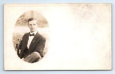 Handsome Hunky Young Man Bow Tie Suit Seated Early RPPC Postcard c.1910 picture