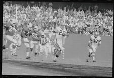 With three cardinals hot pursuit Browns Ray Renfro runs a touch- 1962 Old Photo picture