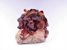 Arcanite crystals on matrix, brown cluster like garnet hessonite or spessartine  picture
