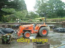 Photo 6x4 Tractor in a pond A Kubota La402st compact tractor was used to  c2004 picture