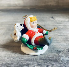Vintage 1991 Child And Puppy Dog On Sled PVC Christmas Ornament picture