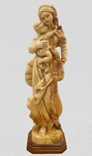 The Virgin Mary Embracing Baby Jesus -Special Handcrafted Olive Wood Masterpiece picture