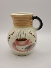 1950's airbrushed creamer. Carafe shape picture