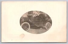 eStampsNet - RPPC Man in Old Car Outside of House Postcard  picture