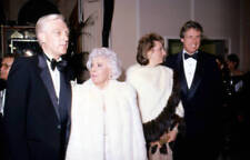 Barbara Stanwyck her date attend an event with designer Nolan Mill- Old Photo picture
