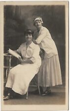 RPPC 2 Women in Studio Wearing White Looking Dreamy c1910  Real Photo Postcard picture