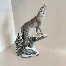Howling Wolf on Snowy Rocks Ceramic Statue Sculpture picture