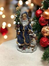 Old Fashioned Santa Figurine With Blue Coat And Hat, Bag Of Toys, And A Snowman  picture