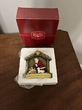 Kneeling Santa With Baby Jesus Christmas Ornament picture