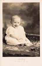 Child with Teething Ring Fehly Ft. Atklinson Studio RPPC (2 Photos) picture