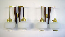 A pair of STILNOVO modernist wall lamps in teak and brass. Opal glass. 1950s picture