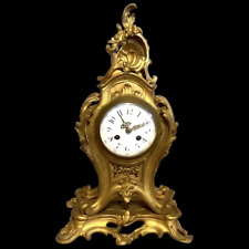 Antique Elegance: 19th Century French Louis XV Bronze Ormolu Table/Mantel Clock picture