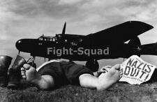 WW2 Picture Photo US serviceman resting  after notice Nazis Quit  3666 picture
