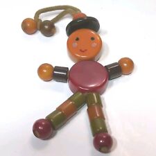 Vintage Bakelite Catalin Tykie Baby Crib Toy Beaded Man Boy with Hat Clean Face picture