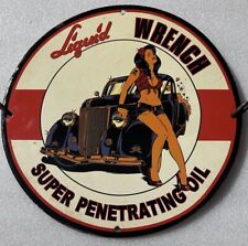 RARE LIQUID WRENCH OIL GAS GARAGE MANCAVE GIRL PINUP PORCELAIN ENAMEL SIGN. picture