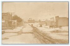 c1910 Main Street Snow Winter Horse Business Musselshell MT RPPC Photo Postcard picture