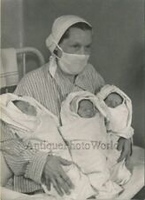 Nurse with newborn triplets vintage Soviet photo by Vladimir Gailis picture