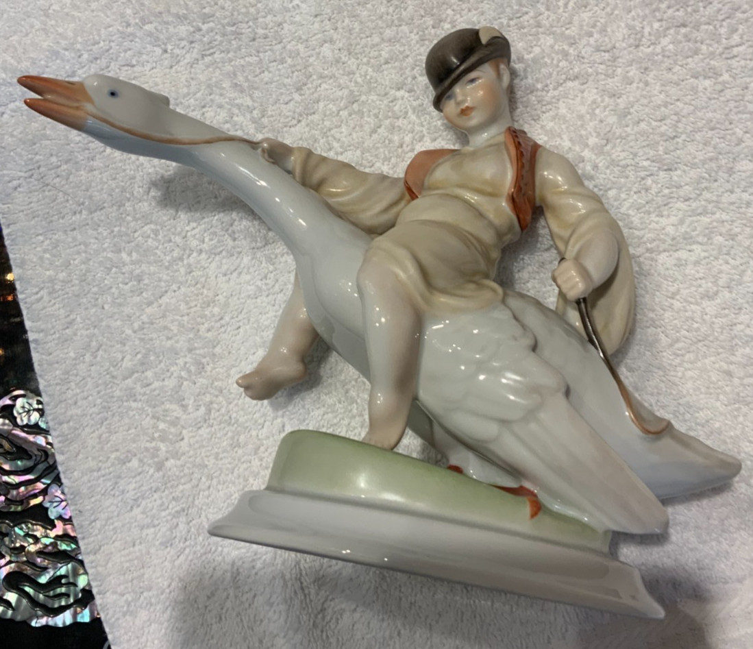 YOUNG VINTAGE BOY FROM HEREND, HUNGARY, RIDING A GOOSE, HAND PAINTED 8 1/2 YOUNG VINTAGE BOY FROM HEREND, HUNGARY, RIDING A GOOSE, HAND PAINTED 8 1/2