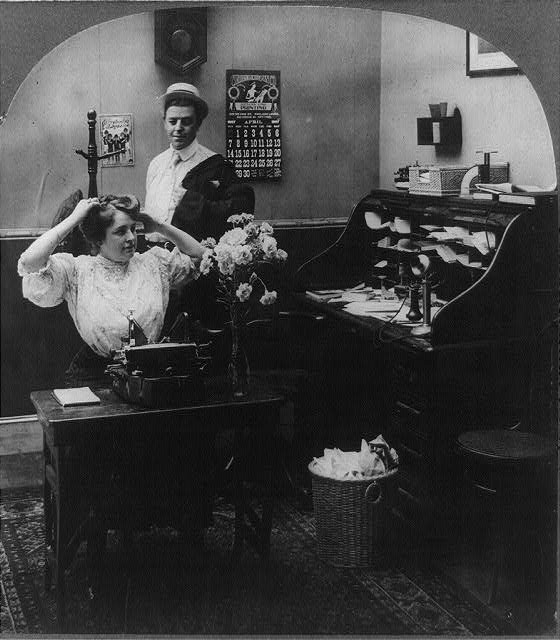 Photo:1907 Office Interior Desk Telephone Woman at Typewriter