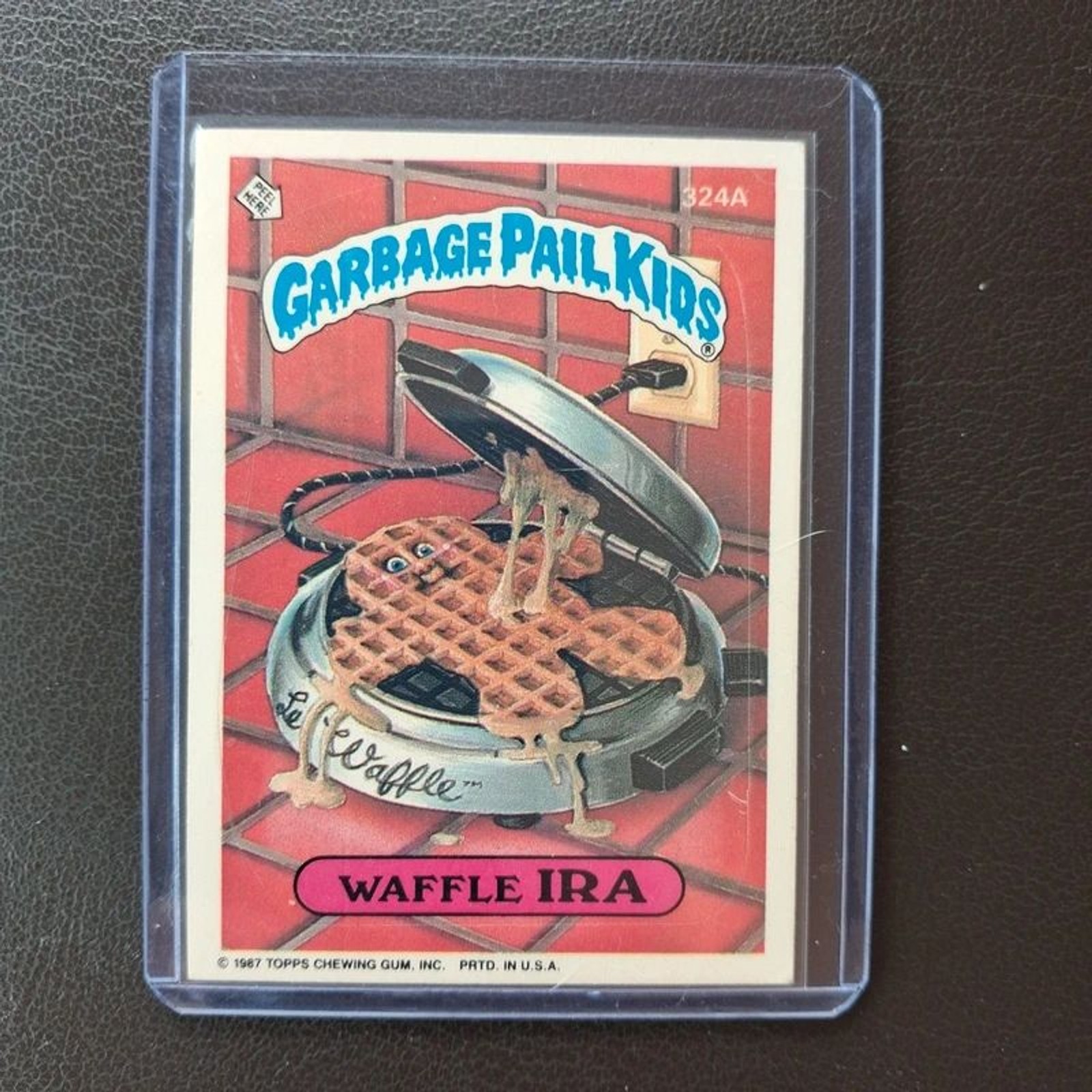 Vintage 1987 Garbage Pail Kids Waffle Ira 324A Sticker on Card Vintage 1987 Garbage Pail Kids Waffle Ira 324A Sticker on Card