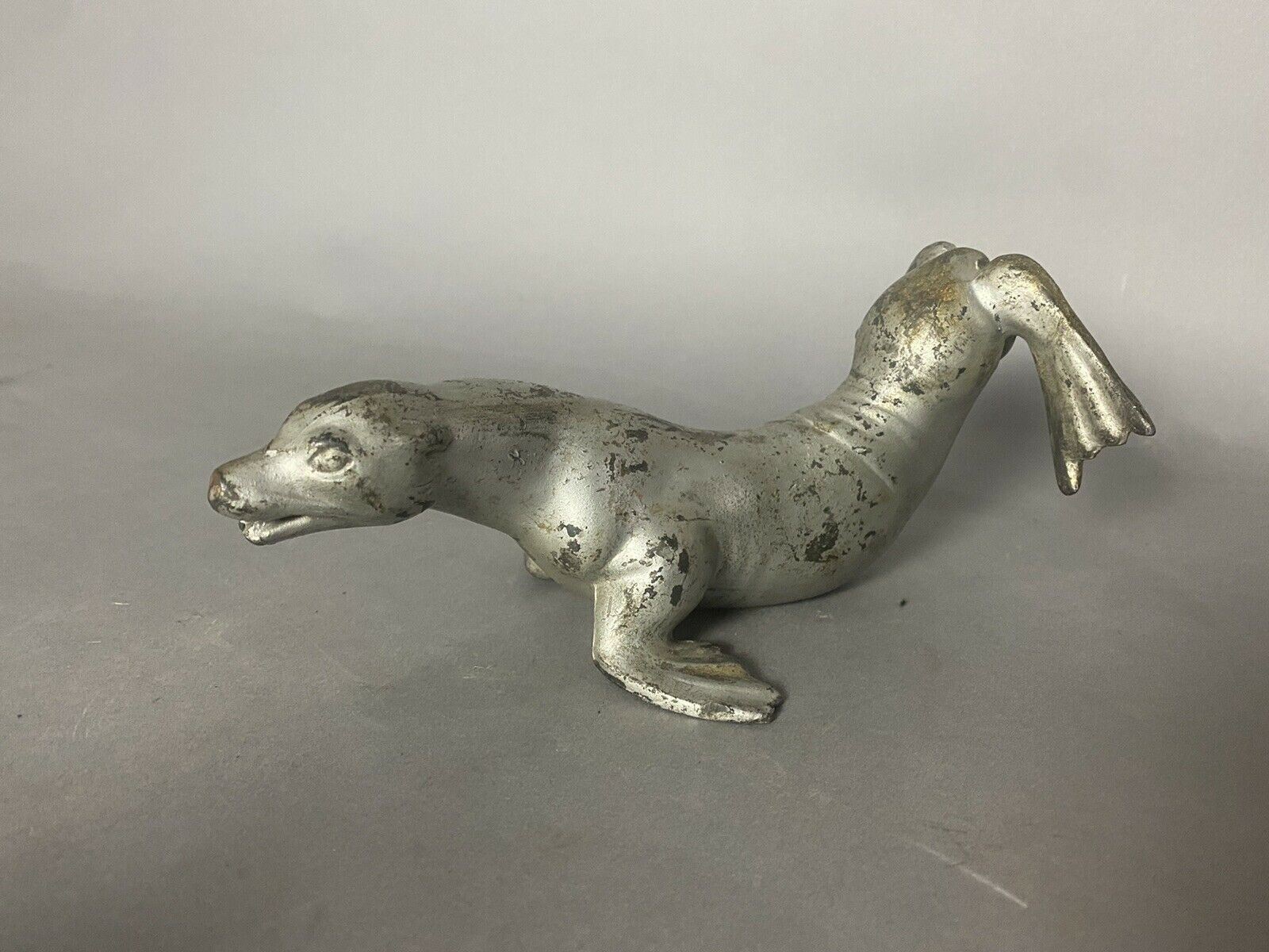 UNUSUAL ANTIQUE ARCHITECTURAL GARDEN FIGURAL METAL SEAL SPIGOT OR FOUNTAIN HEAD