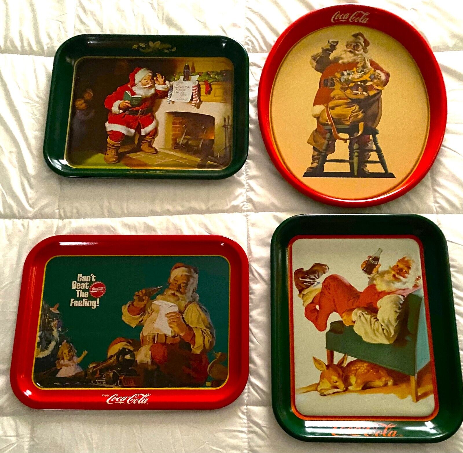 Multiple 1980's Era Coca-Cola Santa Claus trays in good shape