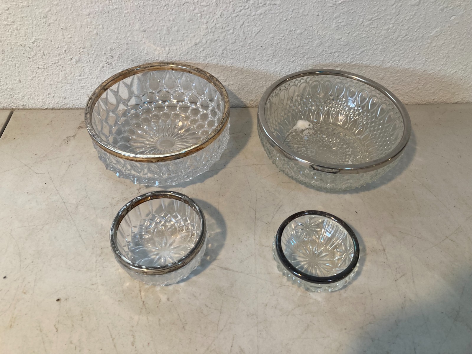 Lot 2 Set Pair of Metal-Rimmed, Heavy, Glass Bowls (8.5 and 4.5 inch diameters) Lot 2 Set Pair of Metal-Rimmed, Heavy, Glass Bowls (8.5 and 4.5 inch diameters)