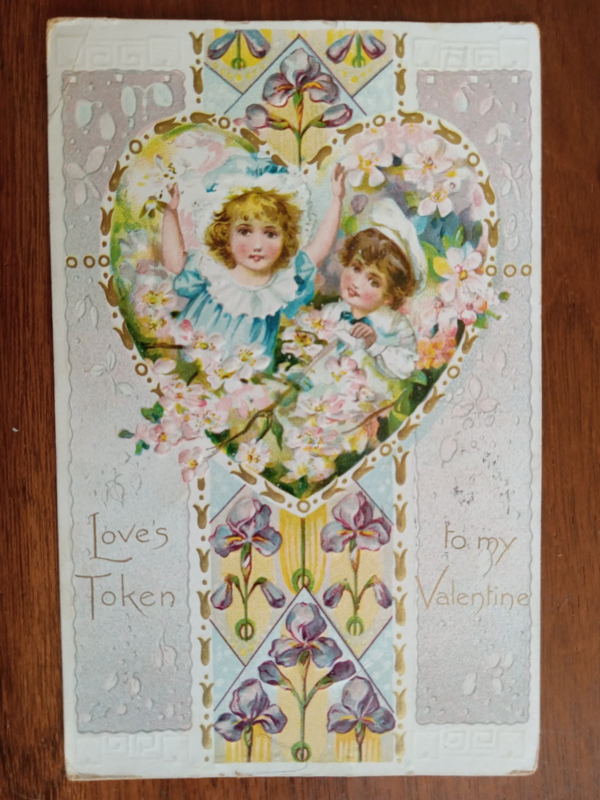 c1911 Embossed Valentine, children with iris and apple blossoms, Raphael Tuck