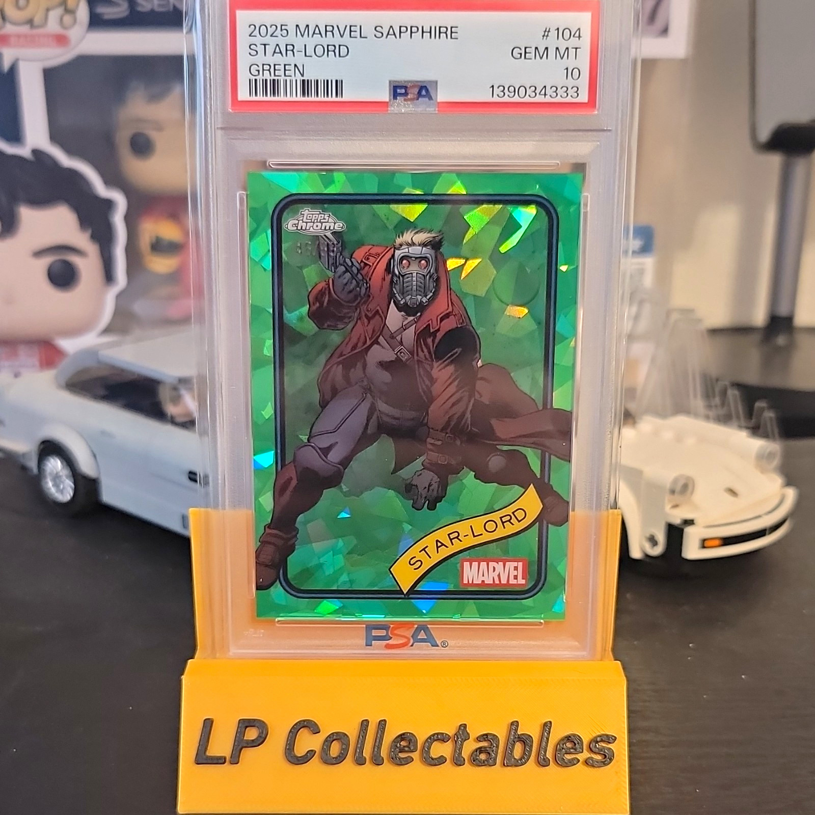 Topps 2025 Marvel Sapphire Star-Lord Green Parallel #104 PSA 10 Cert 139034333 Topps 2025 Marvel Sapphire Star-Lord Green Parallel #104 PSA 10 Cert 139034333