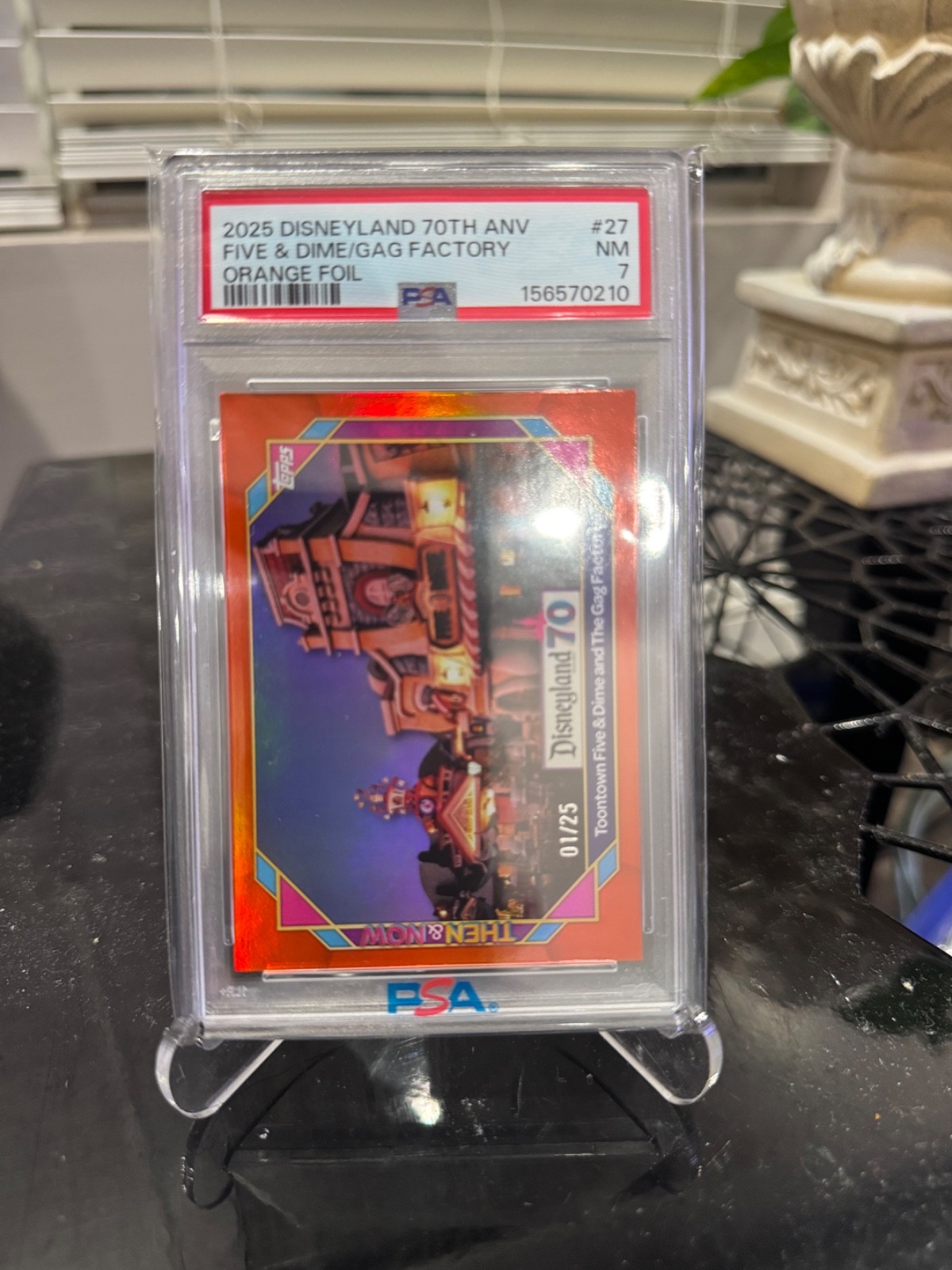 Topps Disneyland 70th Toontown Five & Dime/Gag Factory Orange 1/25 PSA 7 Topps Disneyland 70th Toontown Five & Dime/Gag Factory Orange 1/25 PSA 7
