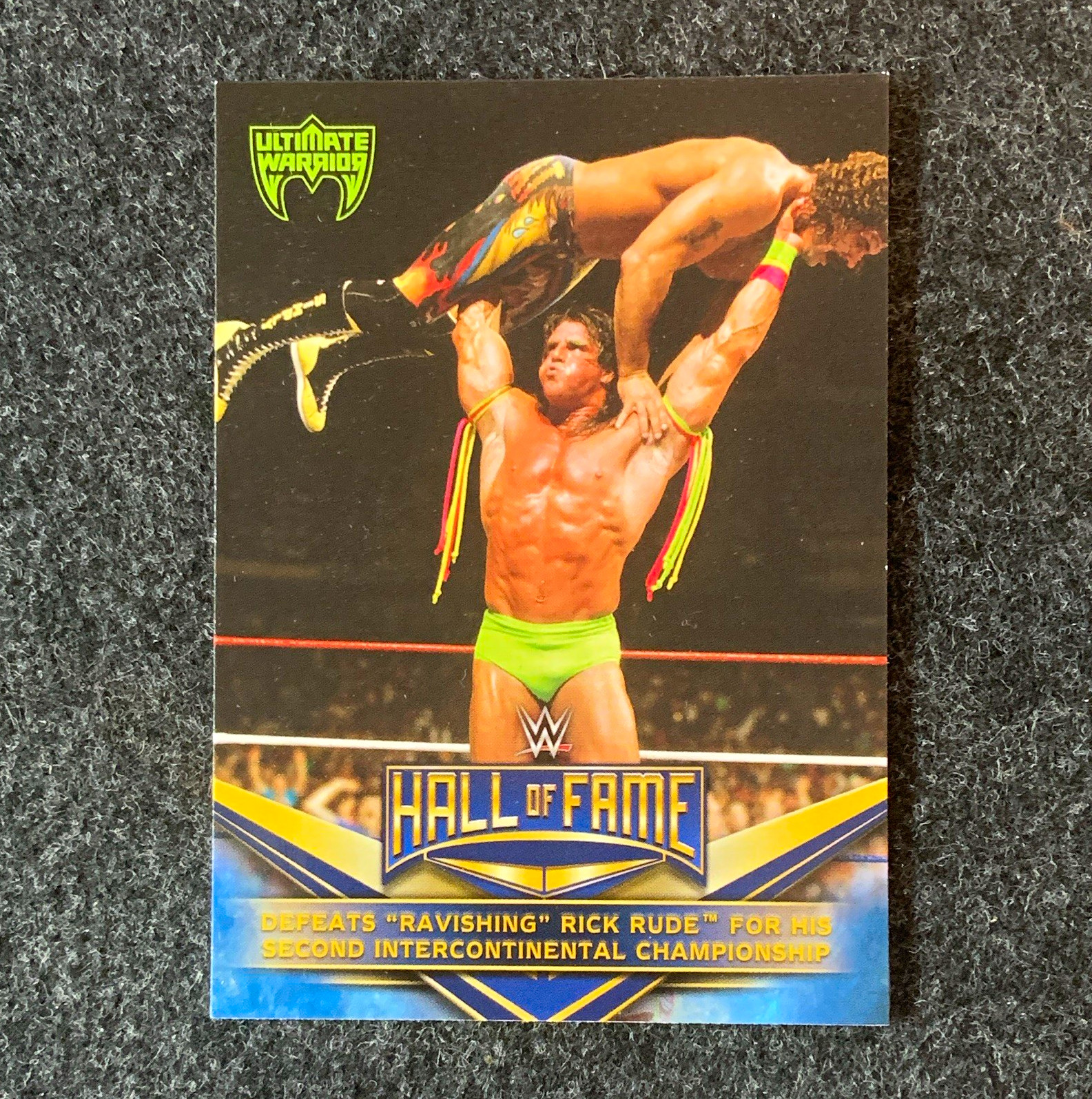 Topps 2018 WWE Hall of Fame #12/40 Ultimate Warrior vs Rick Rude Card Topps 2018 WWE Hall of Fame #12/40 Ultimate Warrior vs Rick Rude Card