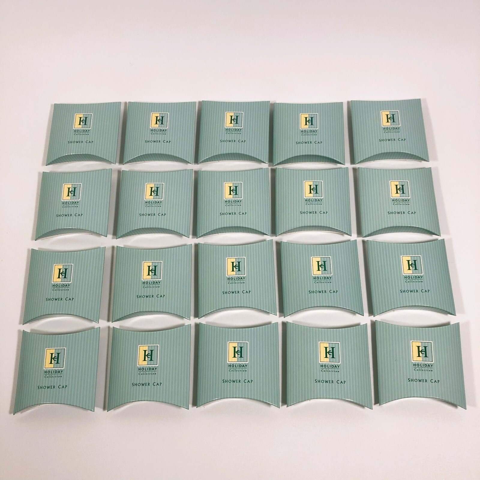 Vintage 1999 Holiday Inn Hotel Shower Caps Individually Wrapped Lot of 20 Vintage 1999 Holiday Inn Hotel Shower Caps Individually Wrapped Lot of 20