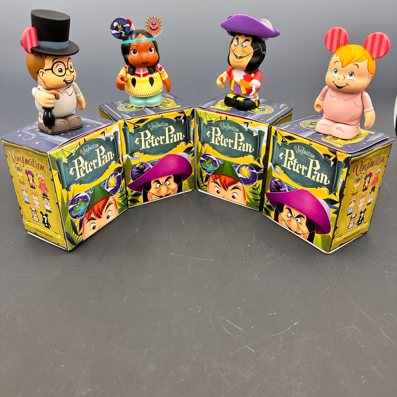 Disney Vinylmation Peter Pan series Hook, Tiger Lily, John, Michael Darling NEW Disney Vinylmation Peter Pan series Hook, Tiger Lily, John, Michael Darling NEW