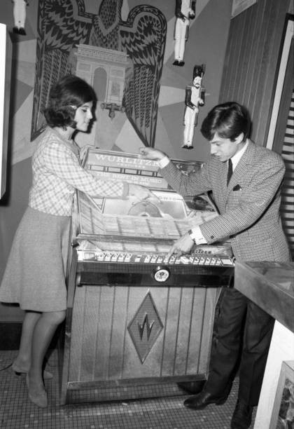Sheila singer Akim next to a Wurlitzer jukebox in Paris on October- Old Photo 2