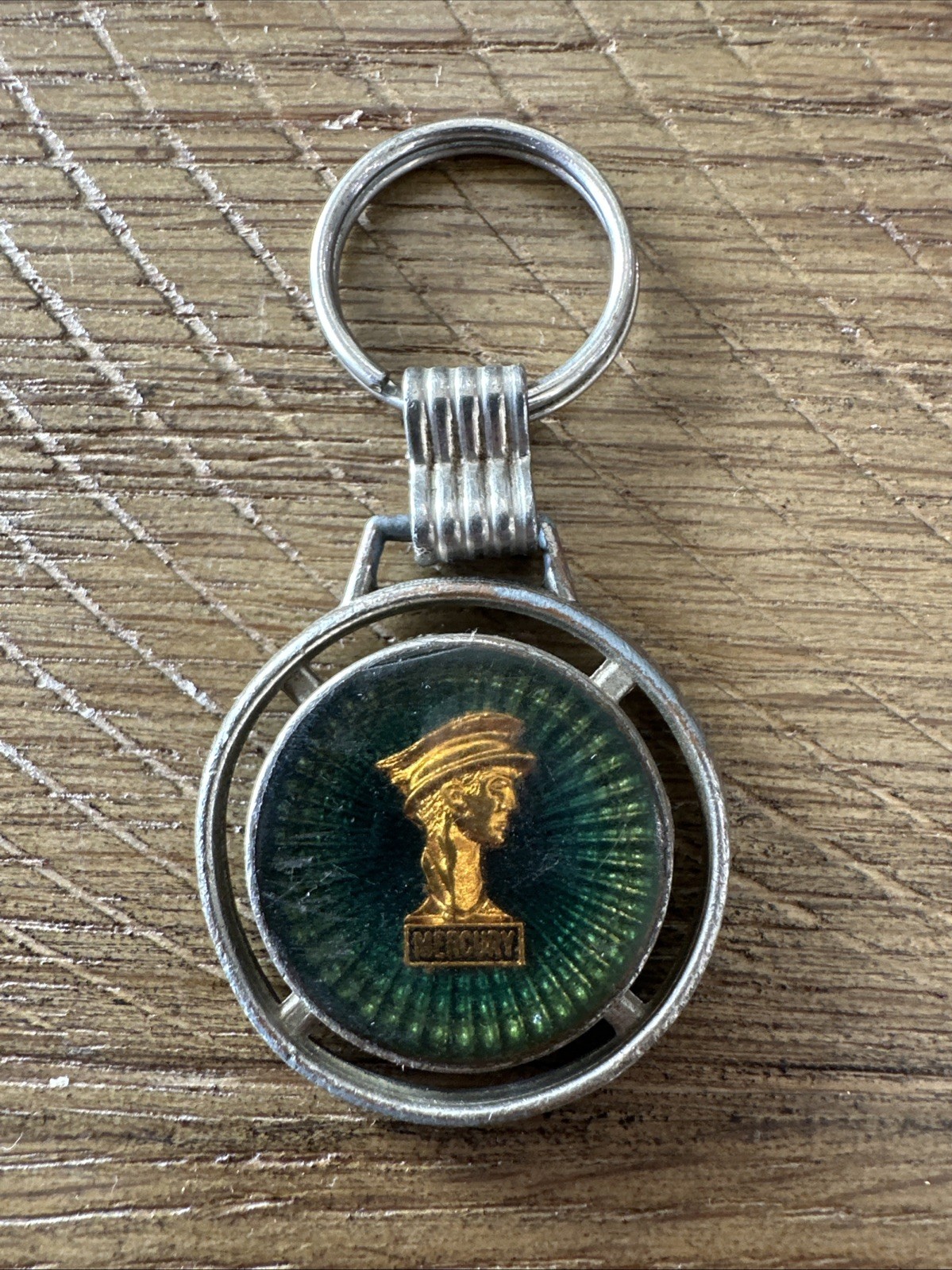 Vintage Mercury Emerald & Gold Tone Head Logo Metal Keychain RARE Vintage Mercury Emerald & Gold Tone Head Logo Metal Keychain RARE