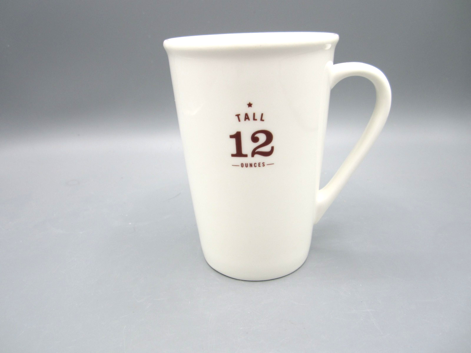 Starbucks White All Around Tall Logo on Bottom Tea Coffee Mug 12 oz 2010 (29) Starbucks White All Around Tall Logo on Bottom Tea Coffee Mug 12 oz 2010 (29)