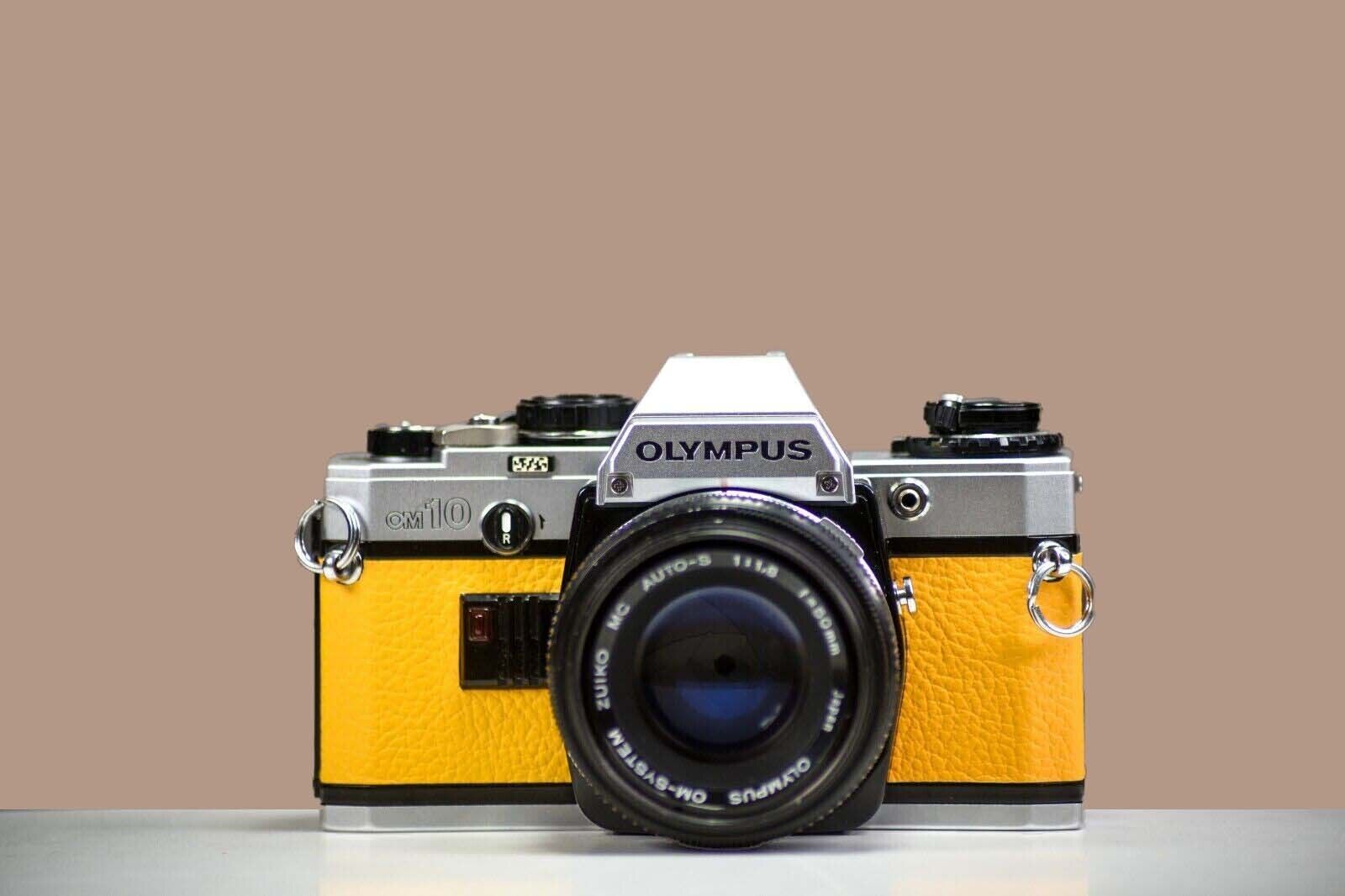 OLYMPUS OM10 35mm Film Camera w/ 50mm f/1.8 Zuiko Lens Yellow Leather | Serviced