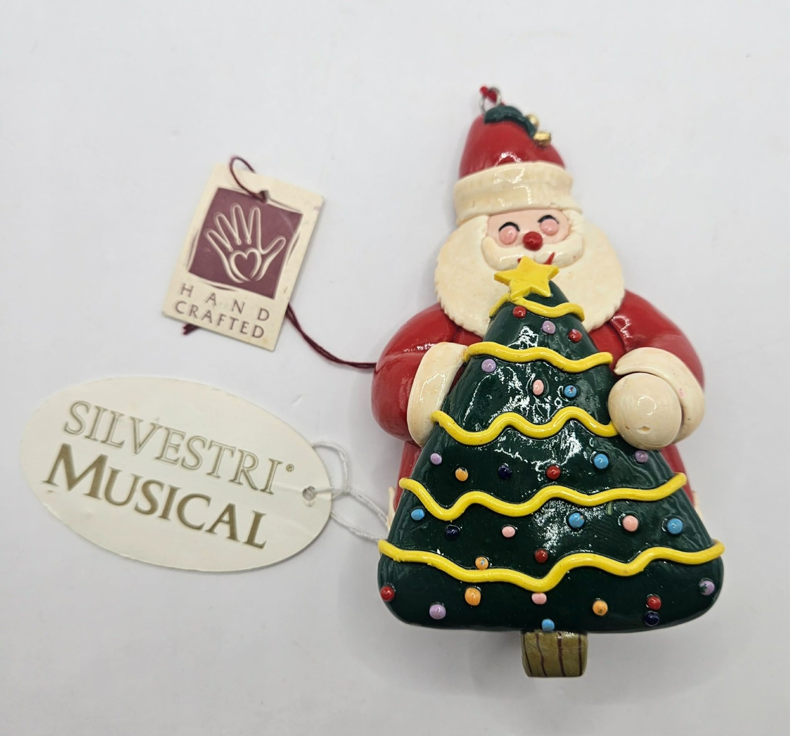 VTG Silvestri Santa with Tree ornament **No Longer Plays Music** 1994 VTG Silvestri Santa with Tree ornament **No Longer Plays Music** 1994