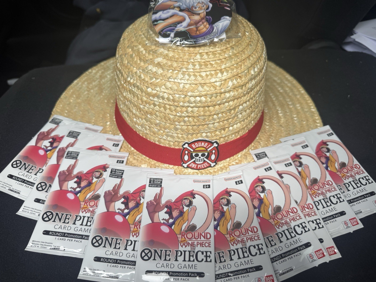 PRESALE (Ships 8/19) Round1 x One Piece Promo PACK SET OF 10 W/ Hat And Pin PRESALE (Ships 8/19) Round1 x One Piece Promo PACK SET OF 10 W/ Hat And Pin
