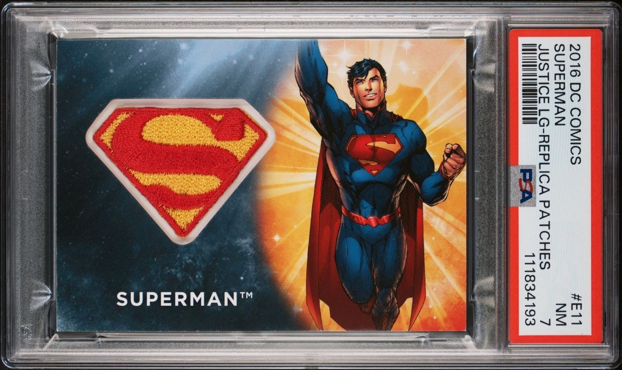 2016 DC COMICS JUSTICE LEAGUE SUPERMAN REPLICA INSIGNIA PATCH #E11 PSA 7