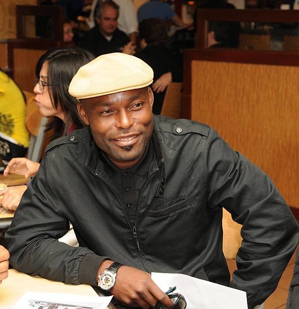 Jimmy Jean Louis at Miami International Airport January 8 2010 Mia- Old Photo 3
