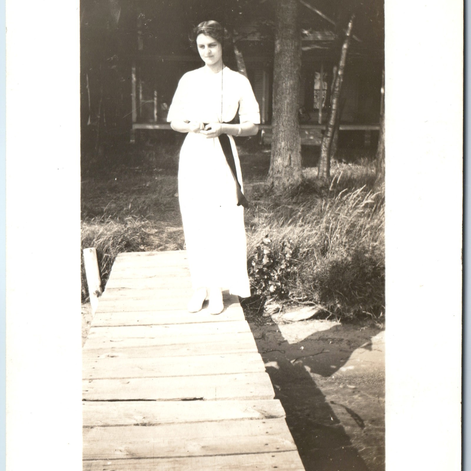 c1910s Elegant Young Woman White Dress Dock RPPC Fashion Portrait Photo Postcard c1910s Elegant Young Woman White Dress Dock RPPC Fashion Portrait Photo Postcard